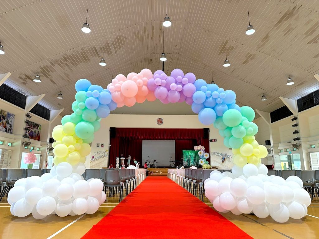 Organic Pastel Rainbow Balloon Arch for rental