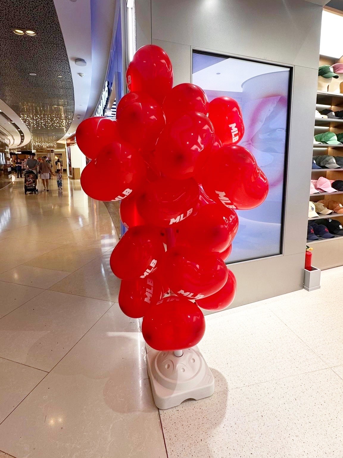 Branded red balloon column Advertising Balloon Singapore retail store