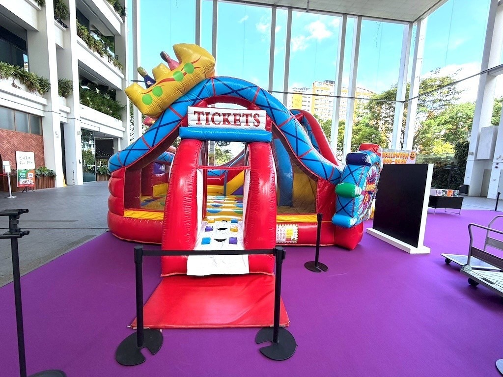 Carnival themed bouncy castle rental for indoor event in Singapore