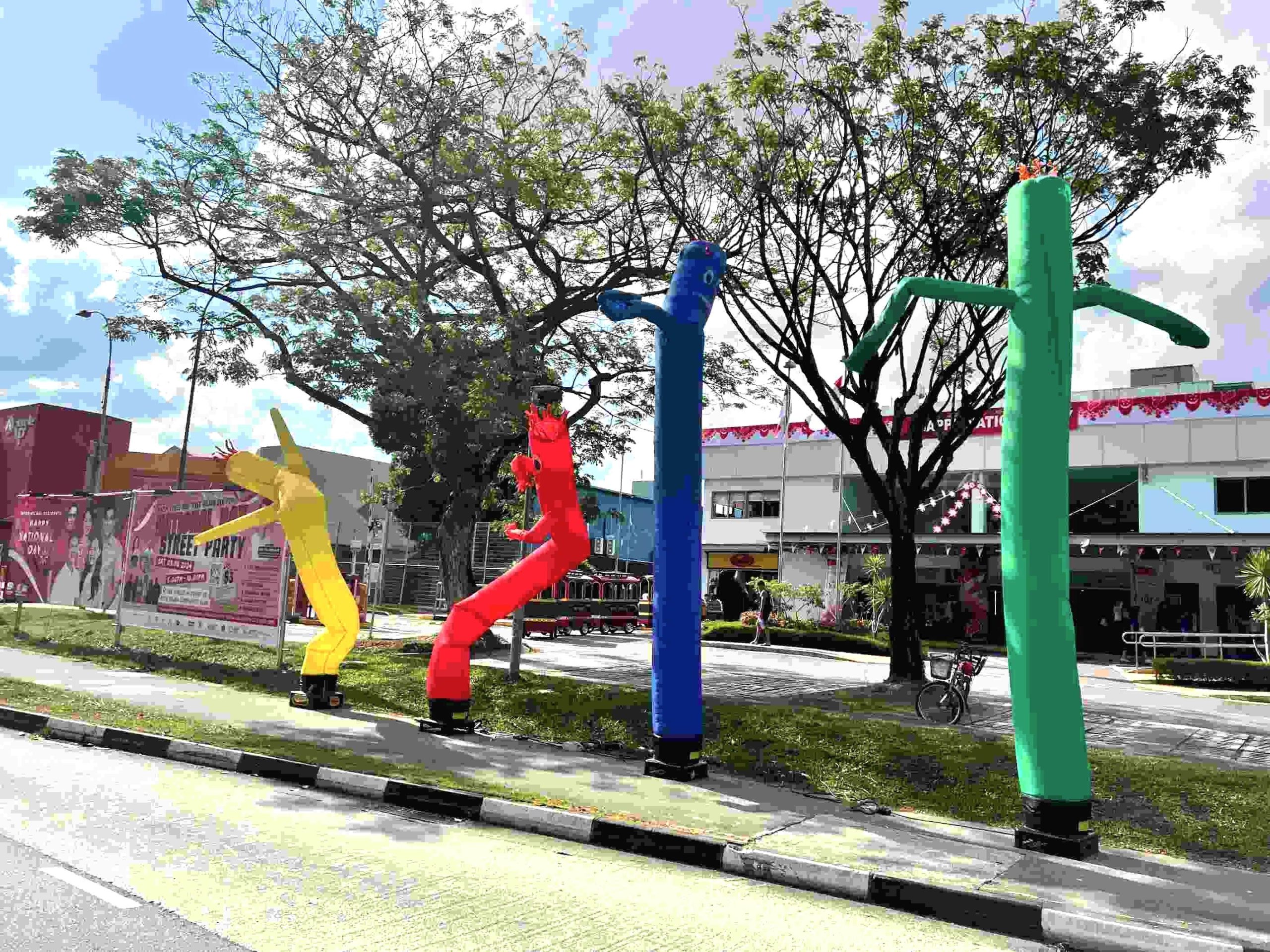 Colorful inflatable air dancers as Advertising Balloon Singapore at a street party rental