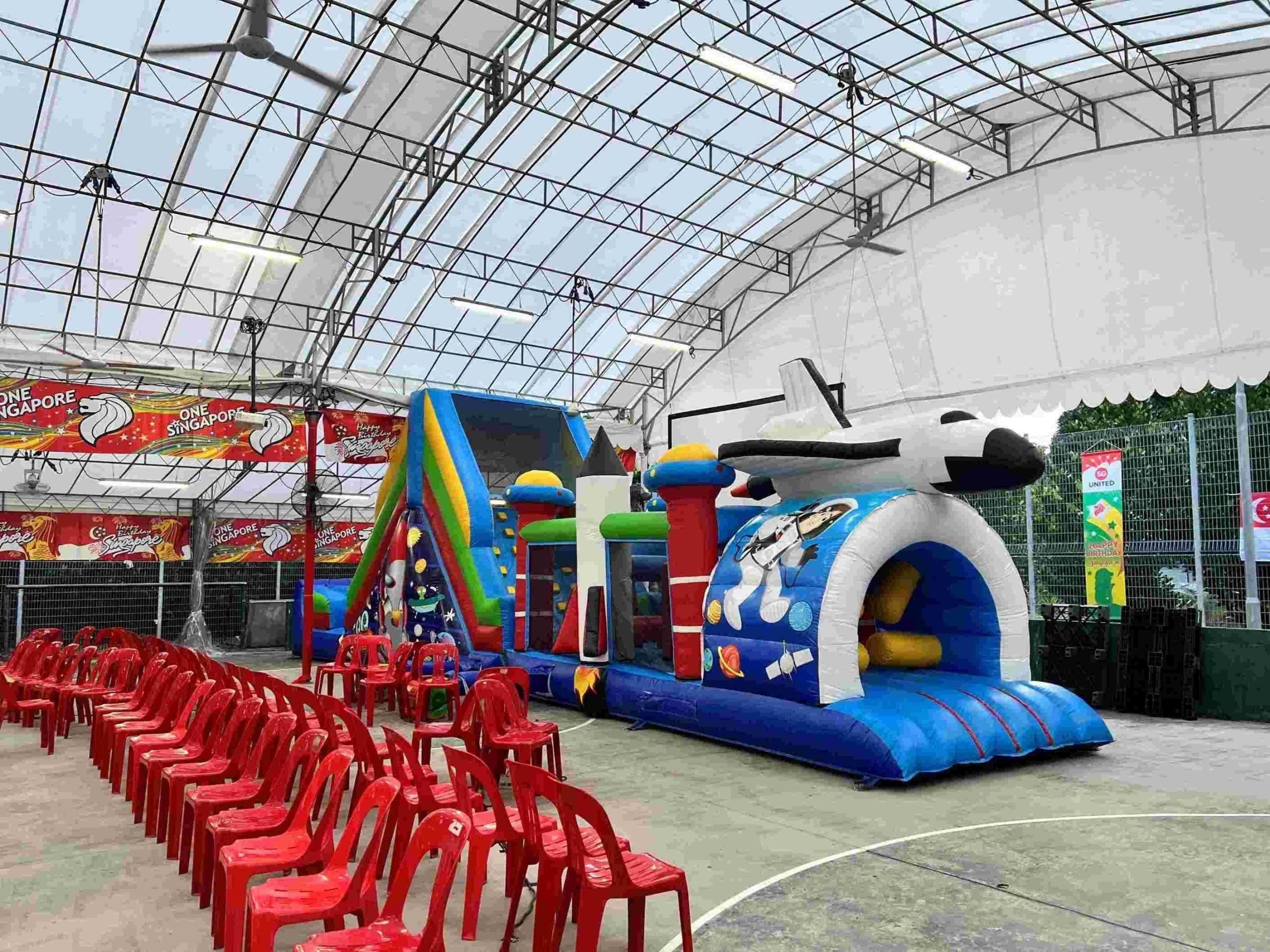 Space-themed inflatable obstacle course rental for community event Singapore