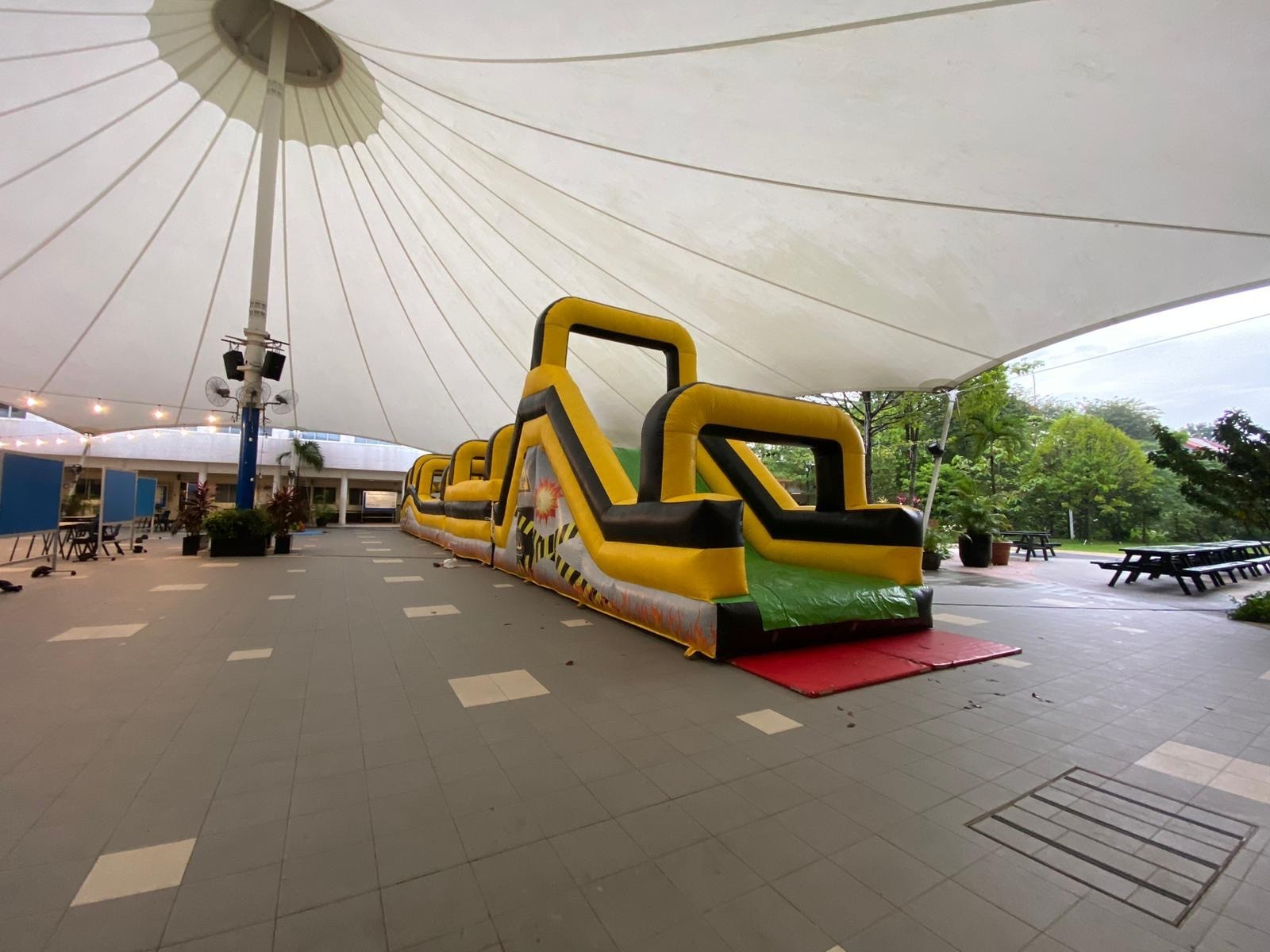 Giant inflatable obstacle course rental for outdoor event in Singapore