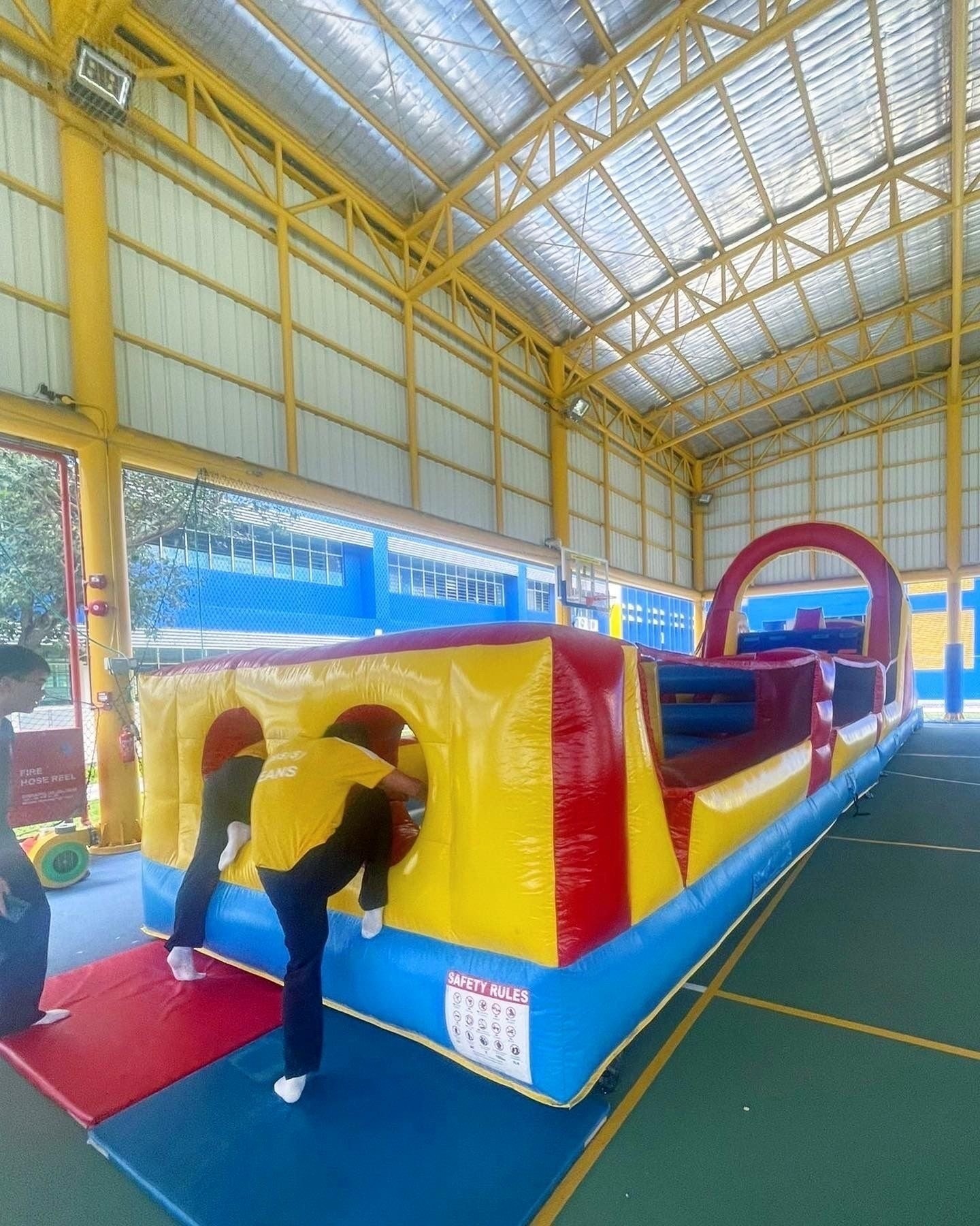 Inflatable obstacle course rental at school event in Singapore