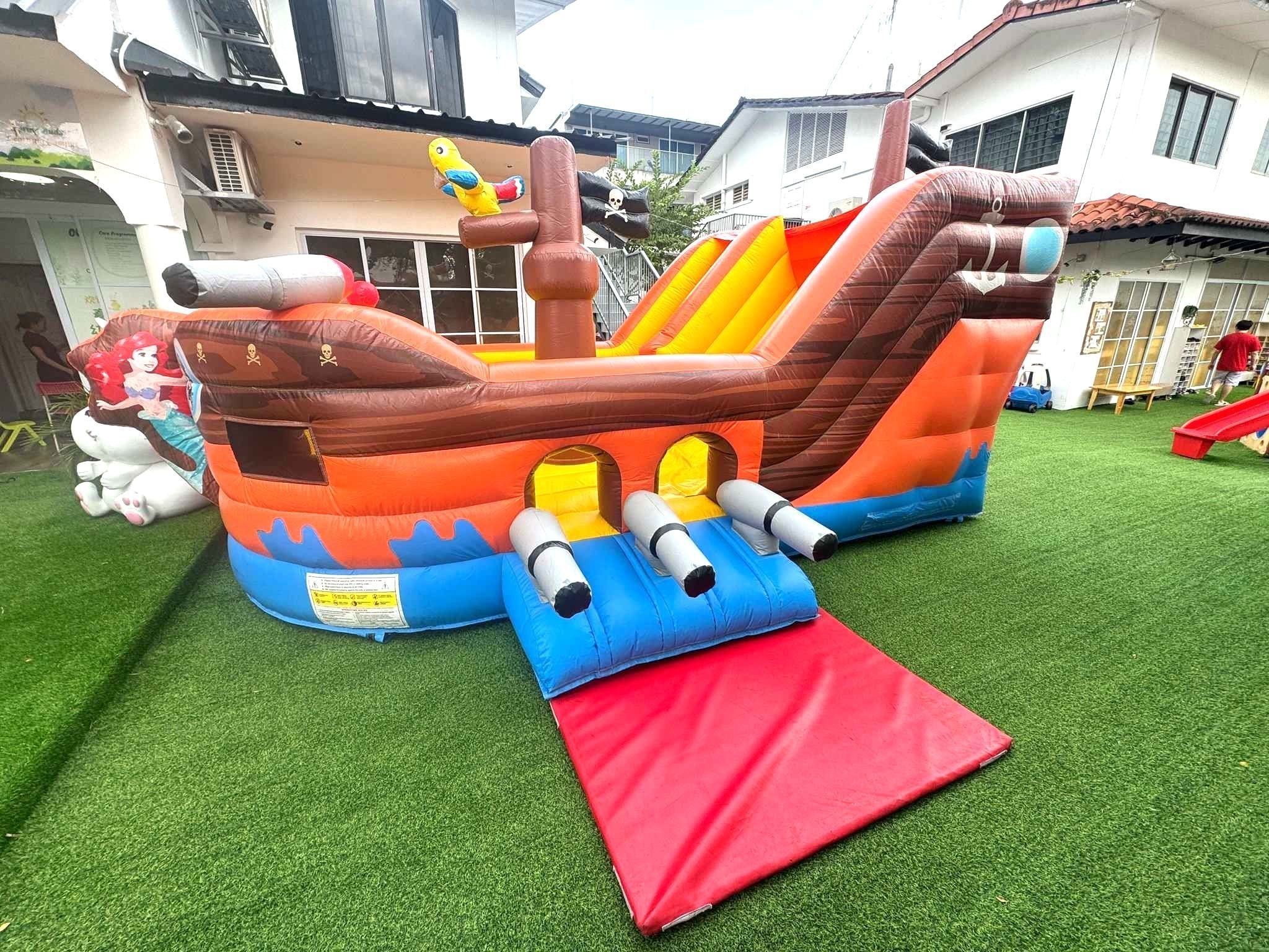 Pirate ship bouncy castle and slide rental for kids party in Singapore