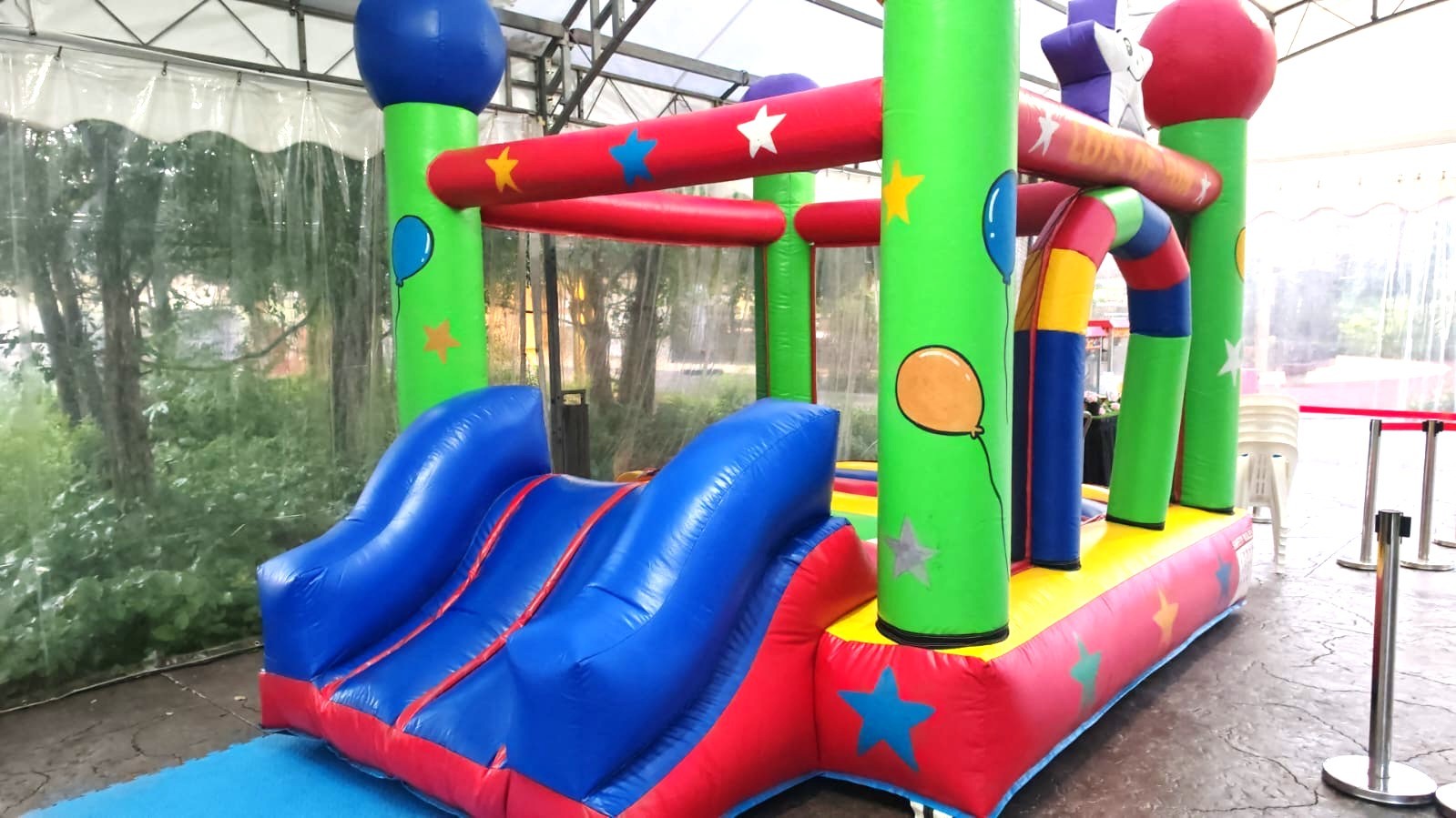 Colourful bouncy castle with slide rental for kids party in Singapore