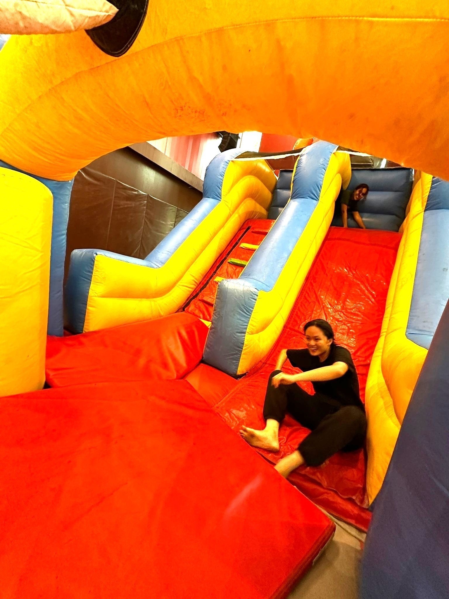 Giant inflatable slide bouncy castle rental for indoor event in Singapore