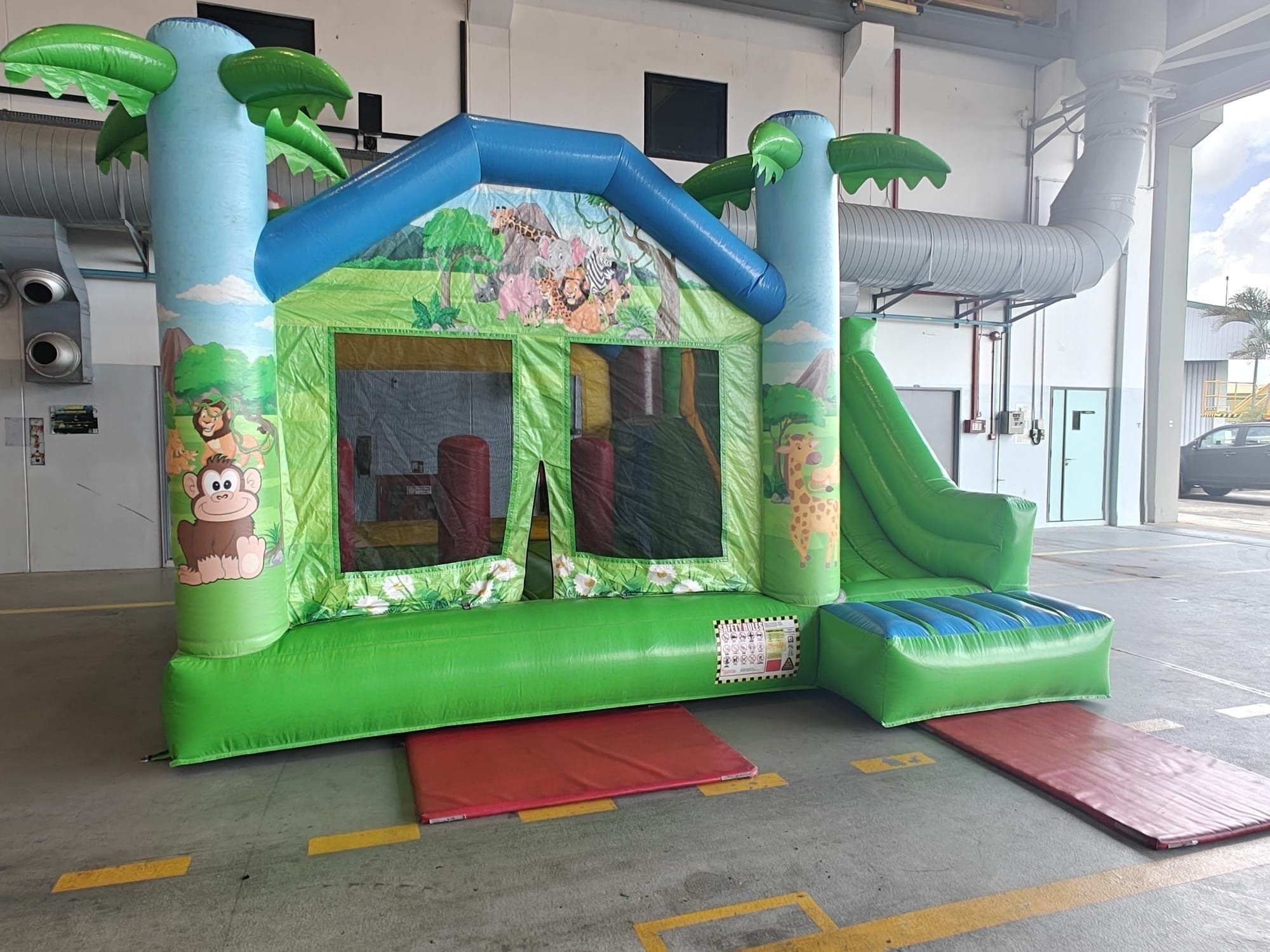 Jungle theme bouncy castle with slide rental in Singapore