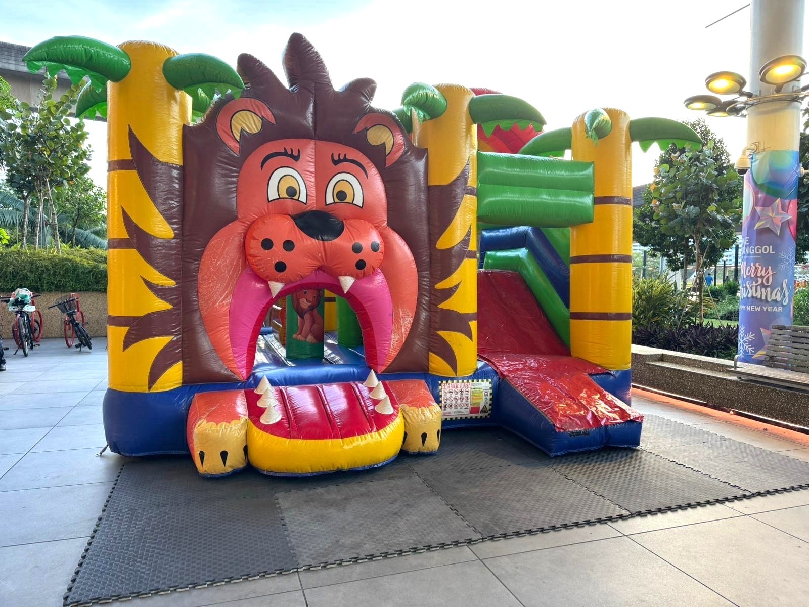 Lion themed bouncy castle with slide rental in Singapore