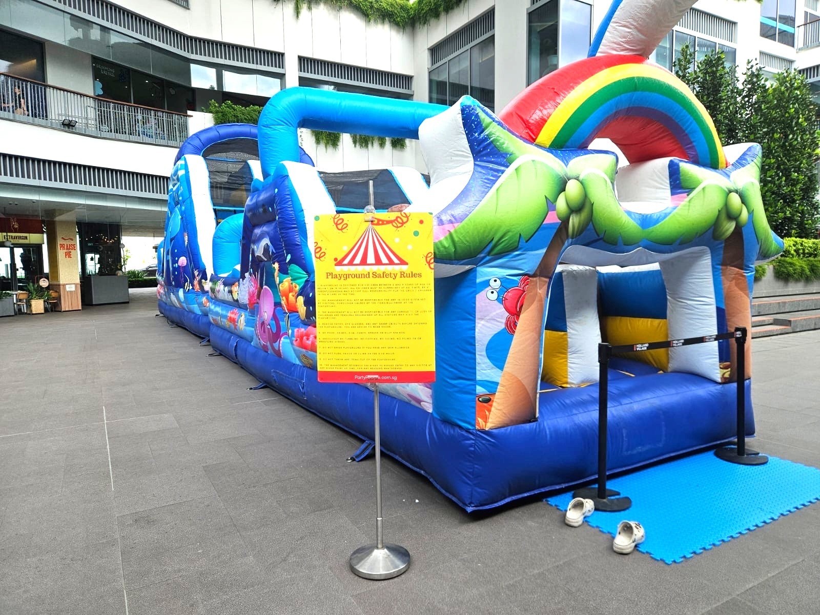 Ocean themed inflatable obstacle course rental setup at Singapore mall