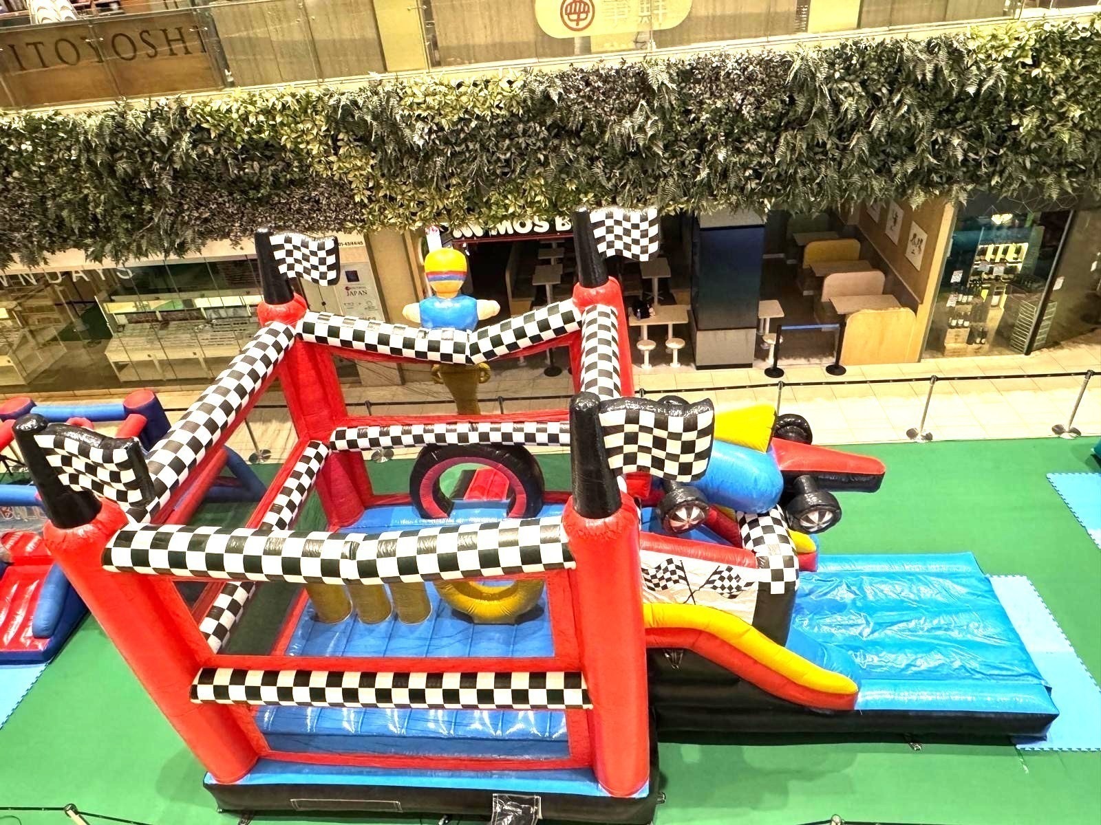 Racing themed bouncy castle inflatable playground at mall Singapore