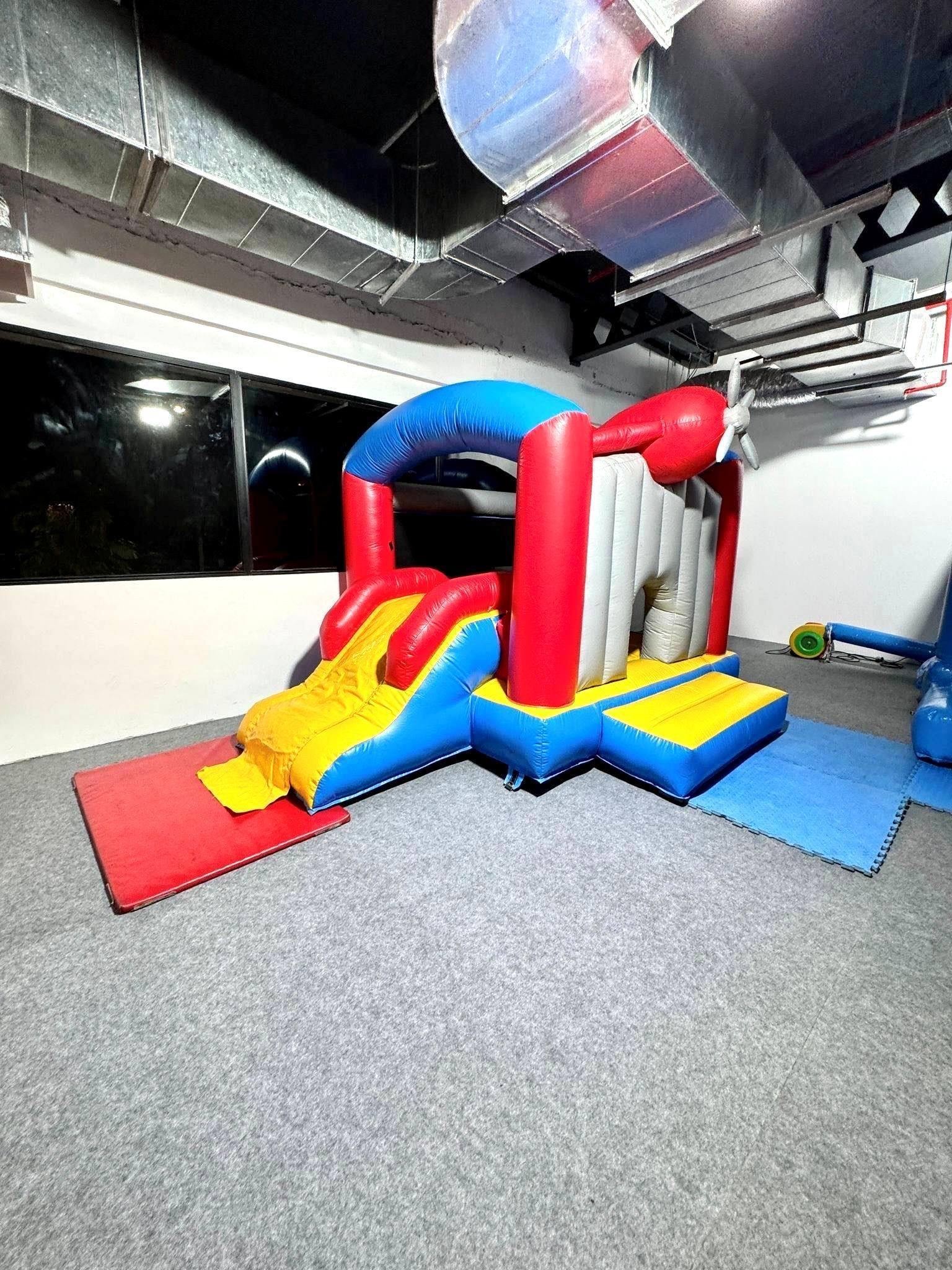 Small bouncy castle with slide for indoor kids party rental in Singapore