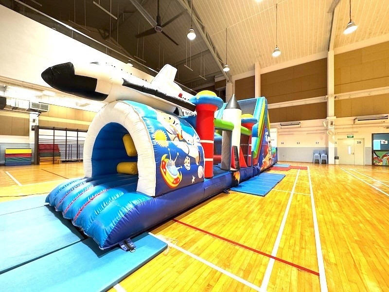Space themed inflatable obstacle course bouncy castle Singapore indoor rental
