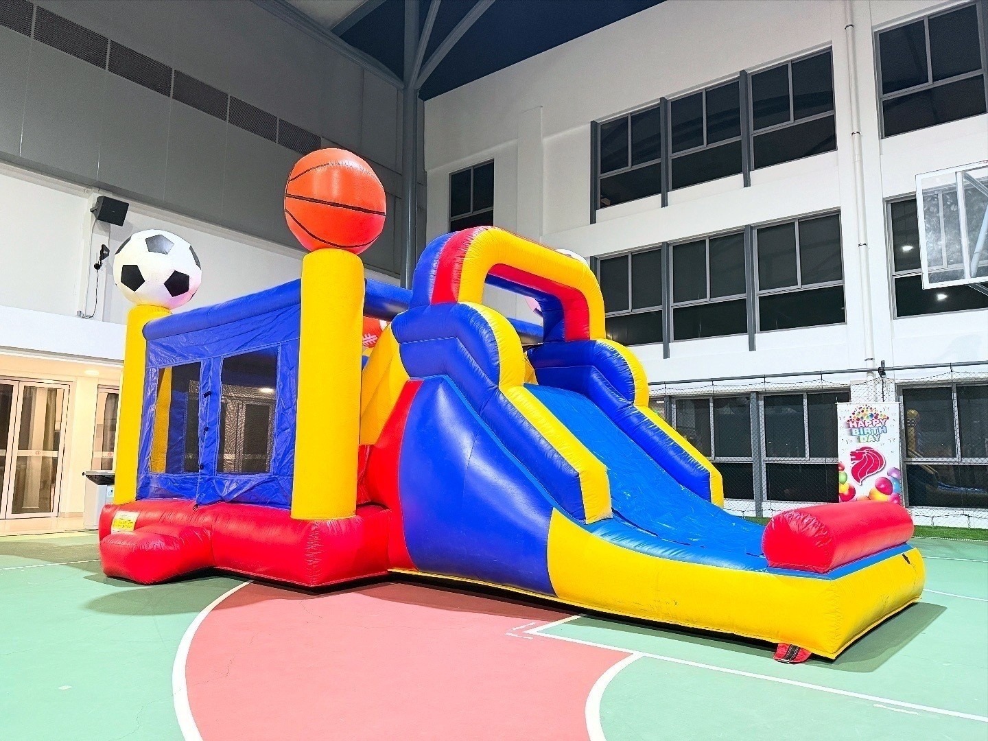 Sports themed bouncy castle Singapore with slide rental