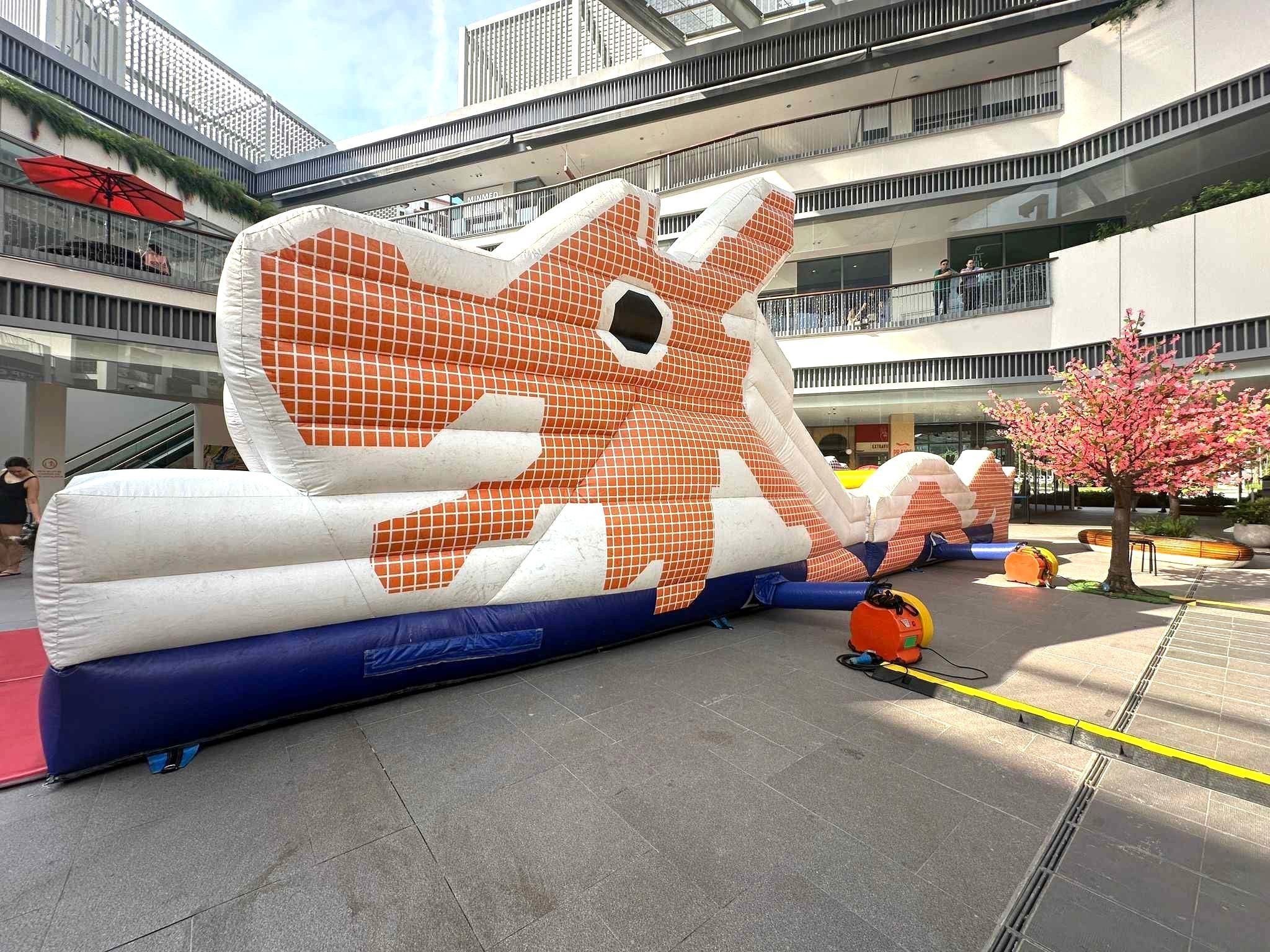 Giant inflatable obstacle course rental at a Singapore mall event