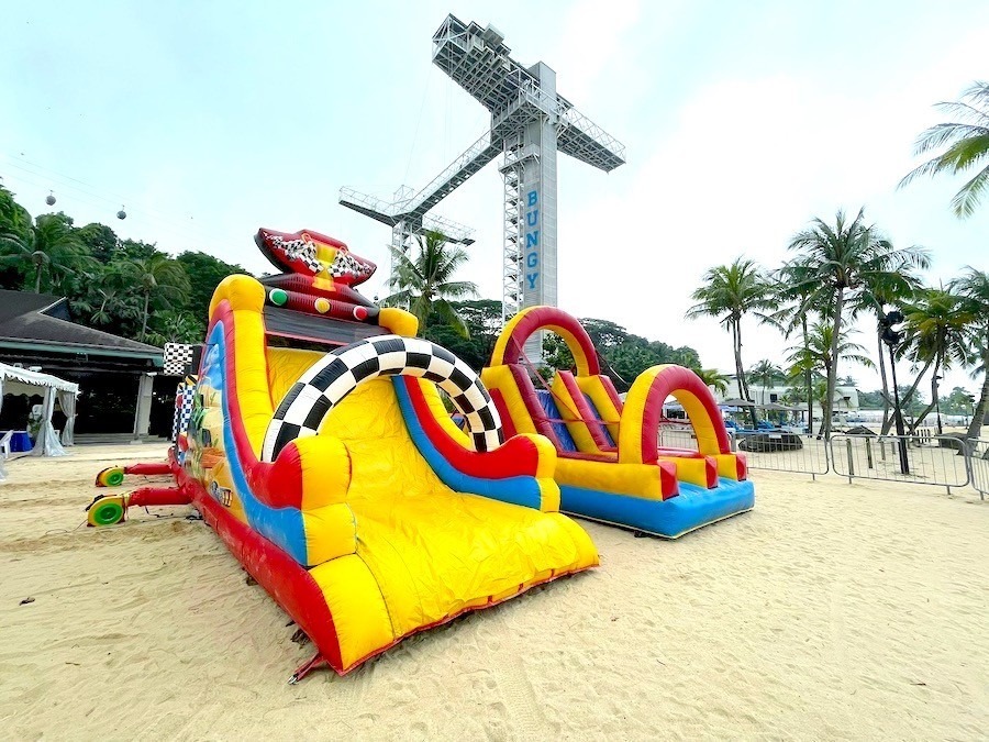 Inflatable obstacle course rental set up for a beach event in Singapore