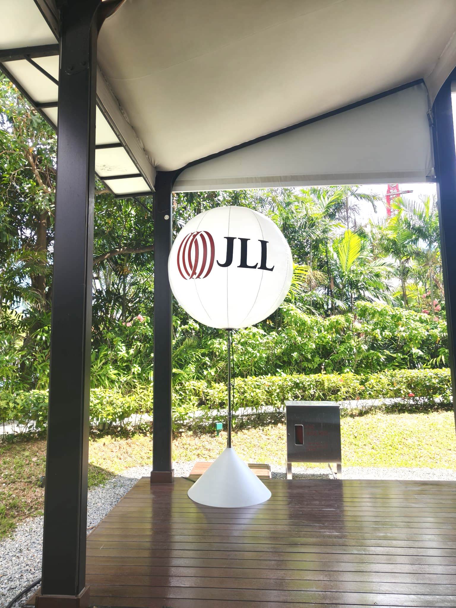 JLL branded advertising balloon at a corporate event in Singapore