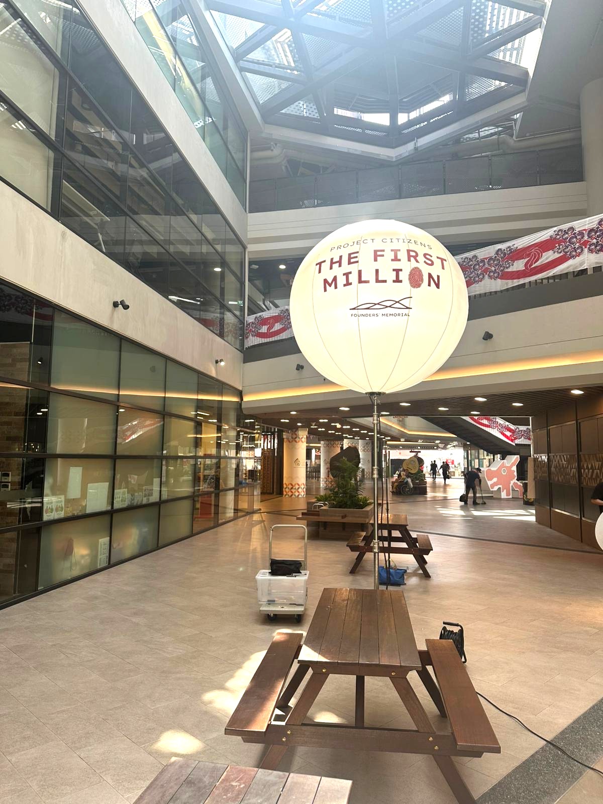 Lighted advertising balloon stand for indoor corporate event in Singapore