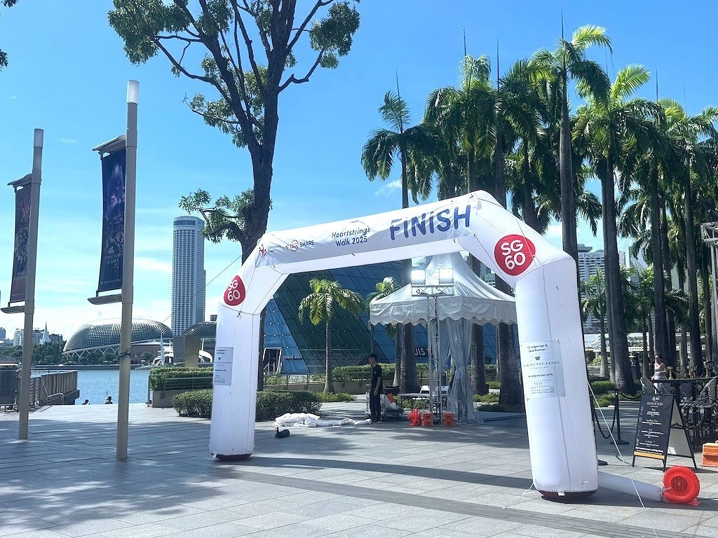 White FINISH arch at the Heartstrings Walk event